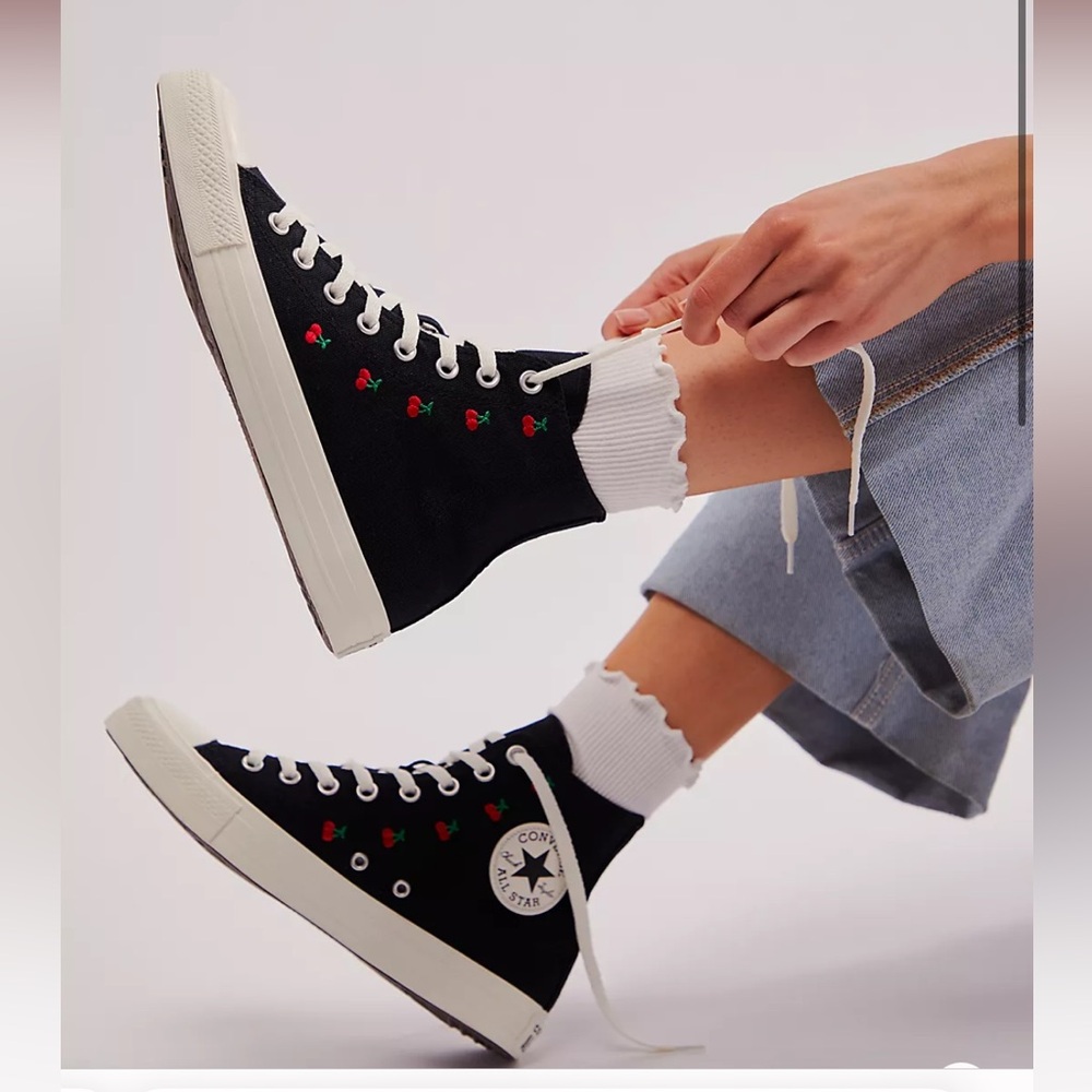 Black high top converse with cherries